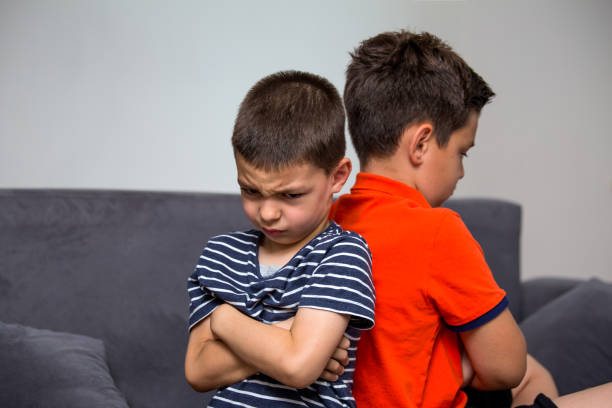 Angry Kids ignoring each other after fight , Sibling Bad relation